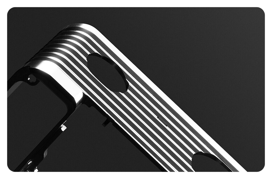 close up of Sony RX0 II duralumin body on dark grey background